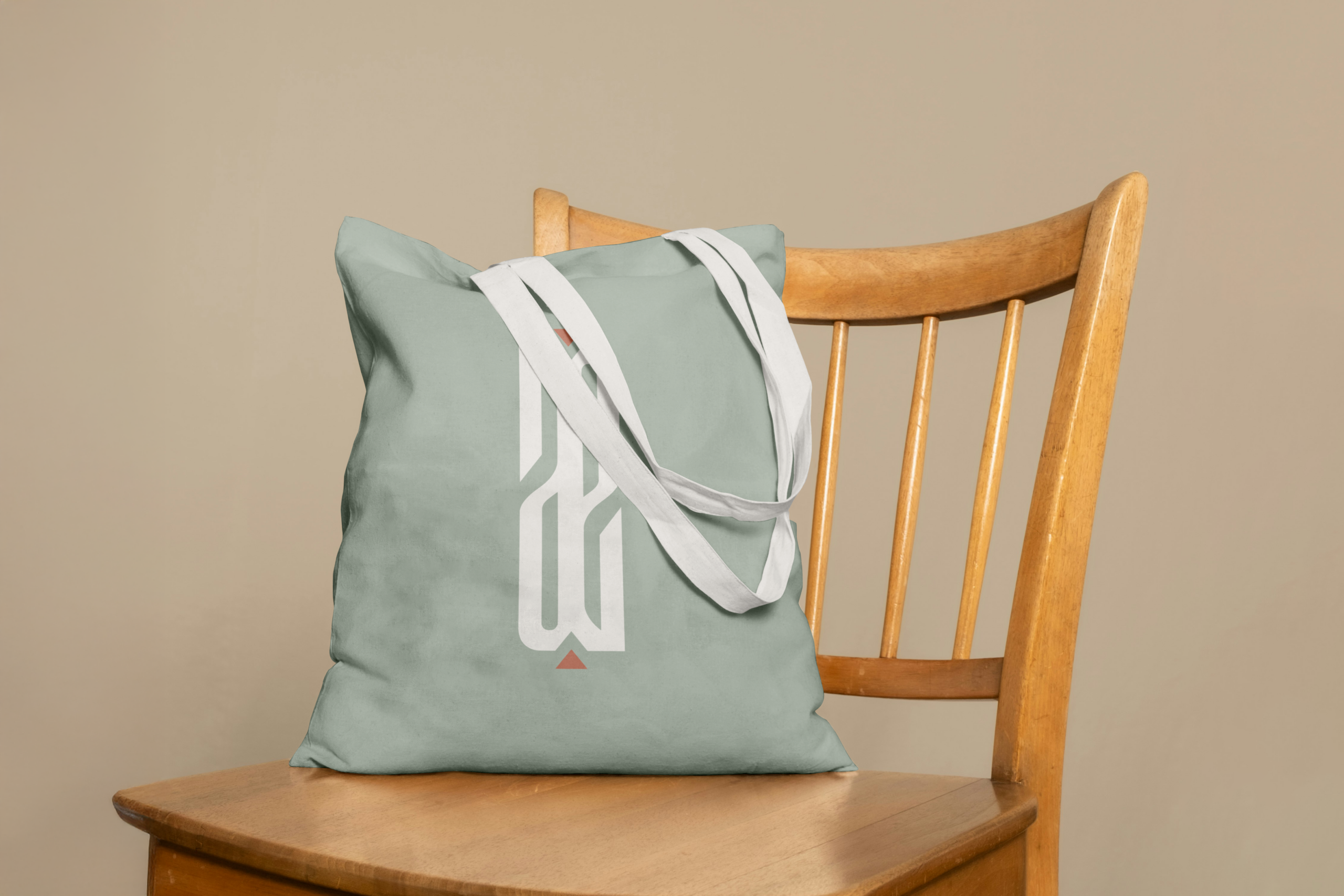 Face 1 d'un tote bag VAEN avec icône de marque.